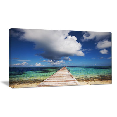 Long Pier Into Serene Maldives Ocean - Wrapped Canvas Print