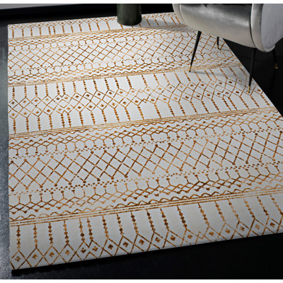 Antaniyah Faux Rabbit Fur Hand Tufted Rug