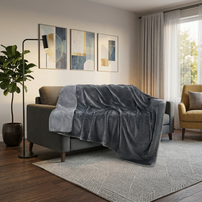 Leak-Proof Throw Blanket for Beds. Reversible, Soft Flannel. Size: Twin (60" x 80"). Spill-Proof and Water-Resistant. Ideal for Protecting Couches and Sofas. Suitable for Movie Nights, Camping, and Travel. Color: Grey.