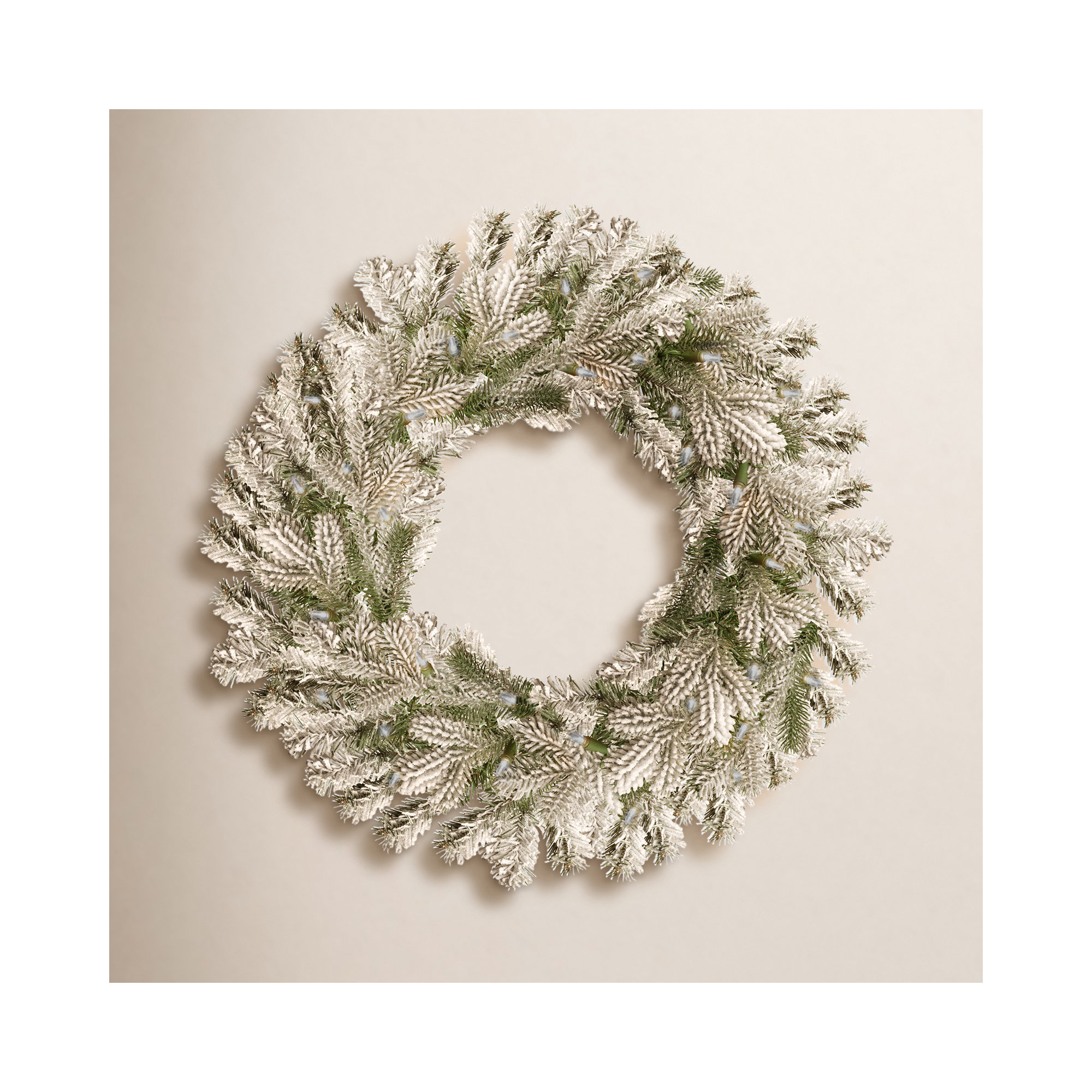 The Holiday Aisle® Snowy Sheffield Spruce Wreath with Battery Operated LED Lights, 24" H x 24" W x 5" D