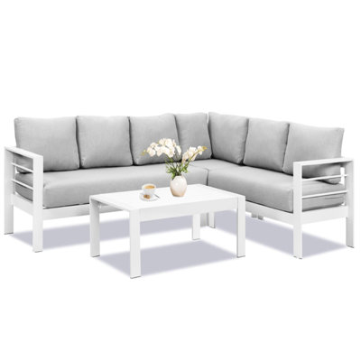 4 - Piece Modern Aluminum Outdoor Sectional With 7 Seats, High Resiliency Cushions, And A 43"24" Faux Wood Coffee Table For Compact Spaces Living