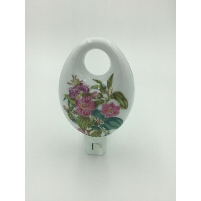 Nalaysia fleurs roses sur une veilleuse ovale