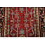 Tapis rouge à motif géométrique 3x21
