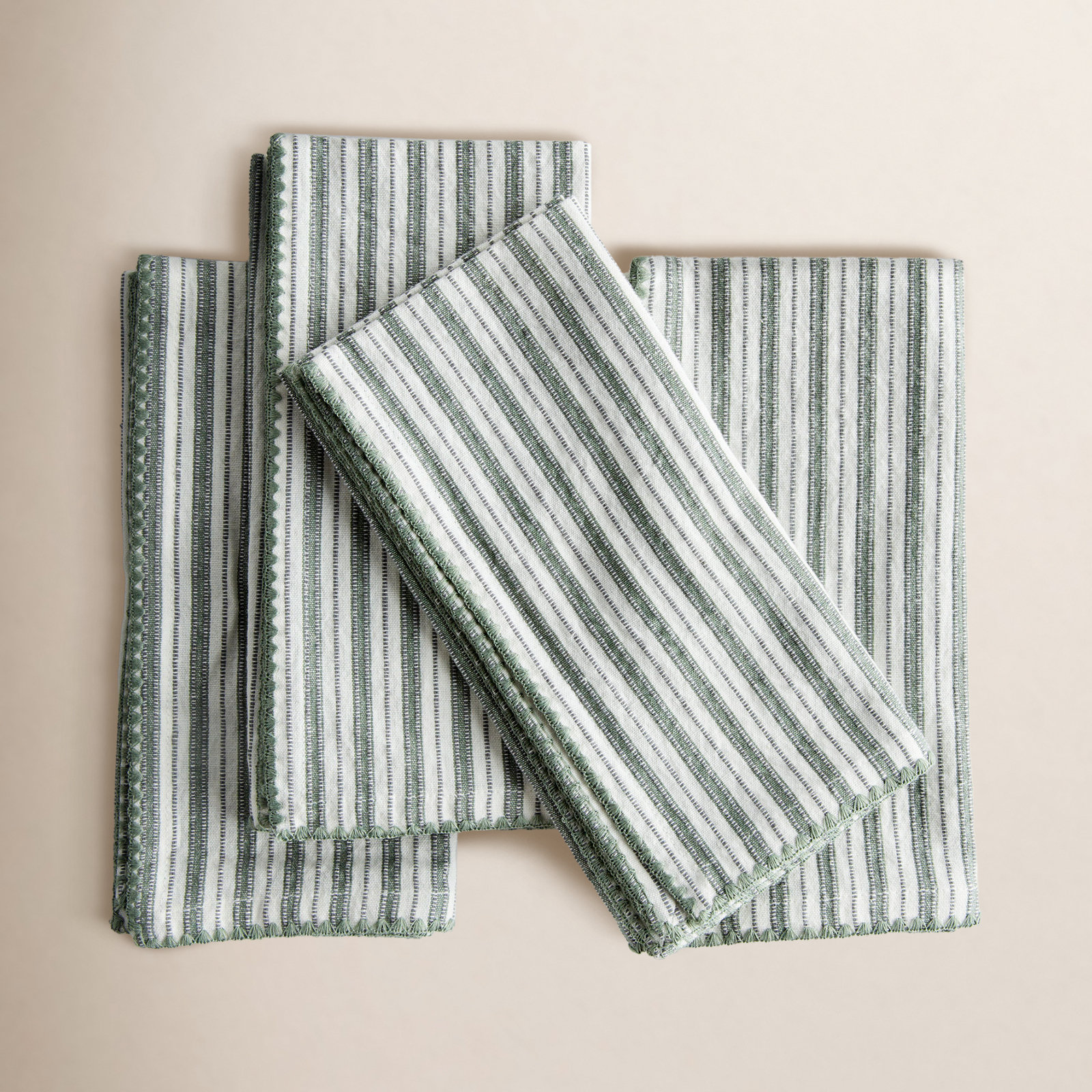 Olenna Feuille Cotton Dinner Napkins in Verdant Green, Looped Border, Striped