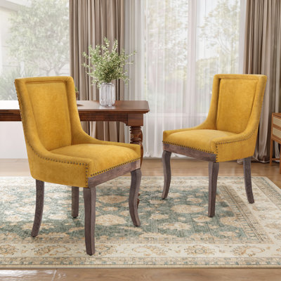 Chaises de salle à manger à garniture cloutée en tissu épaissi avec pieds en bois (ensemble de 2)