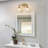 Emilye Brass Dimmable Armed Sconce