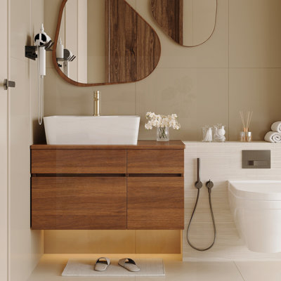 Petit meuble-lavabo flottant simple avec lavabo, conception peu encombrante pour les salles de bain modernes et minimalistes.