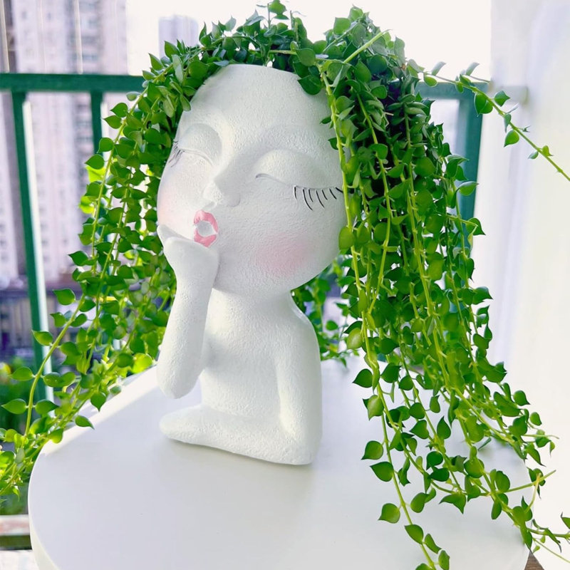 Pot de fleurs Face Face