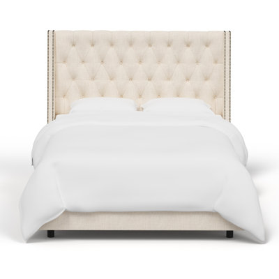 Avala Upholstered Wingback Bed