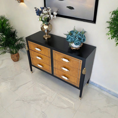 Modern sea shell handle drawer accent cabinet.