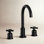 Kingston Brass Millennium Two-Handle 3-Hole Deck Mount Widespread Bathroom Faucet with Brass Pop-Up Drain