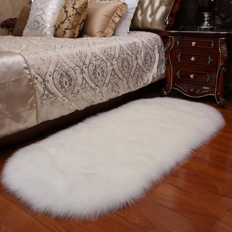 Oval Solid Colour Faux Sheepskin 180cm X 100cm Area Rug