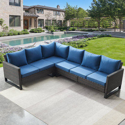 Nazime 105.1" Wide Outdoor Wicker Patio Sectional with Cushions by Latitude Run