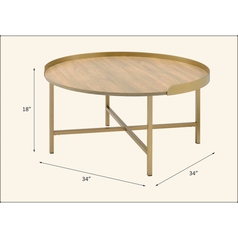 Table basse en chêne et finition dorée