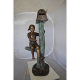 Boy Sitting on a Tree with Mailbox Bronze Statue -  Size: 22"L x 23"W x 49"H. 