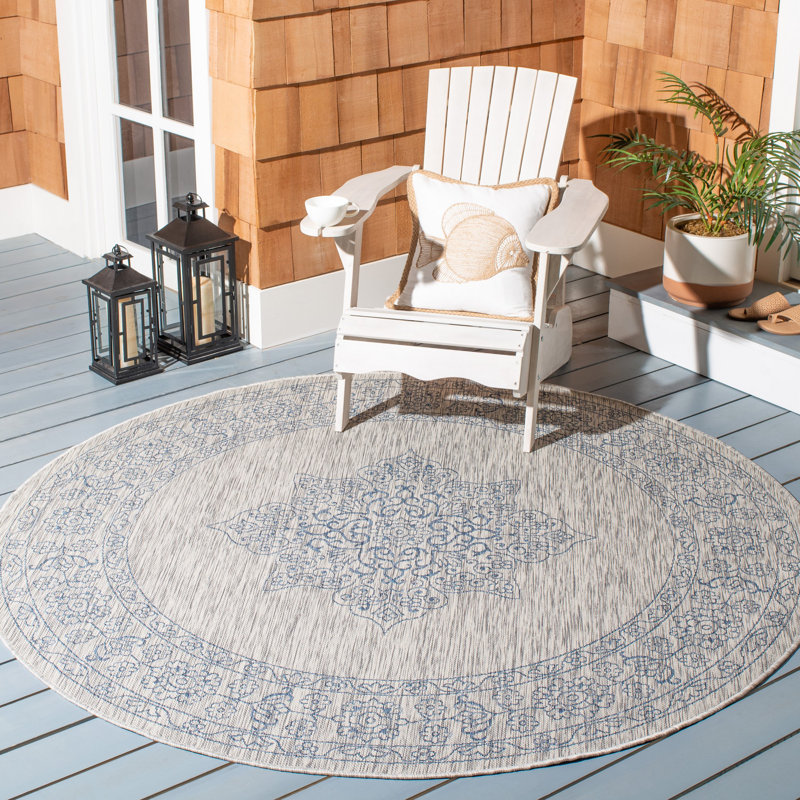 Arneshia Southwestern Aqua Indoor/Outdoor Area Rug, Round 6'7"