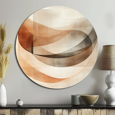Décoration murale ronde en métal beige avec courbes abstraites