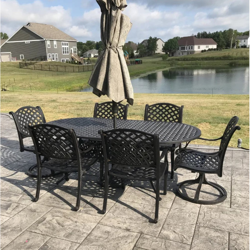 Middleburgh 6 - Person Patio Dining Set with Oval Table , Cushions Included, Olefin Walnut