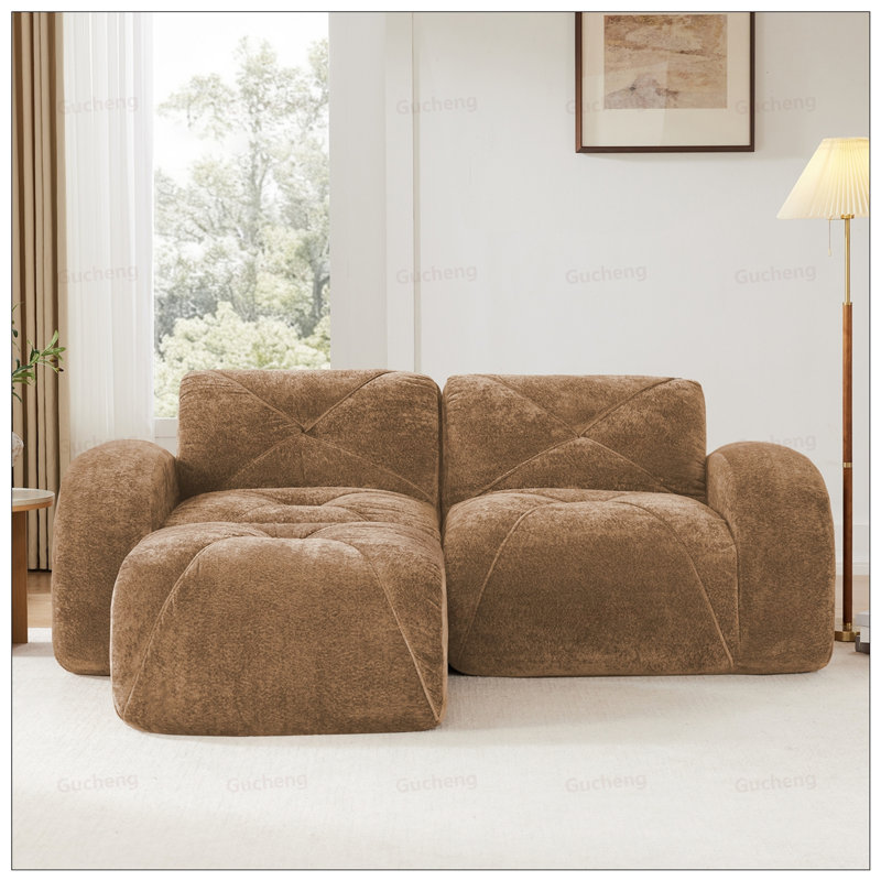 Canapé en L en velours sans os avec design capitonné, éponge haute densité et repose-pieds mobile pour une utilisation polyvalente dans les chambres et les salons.