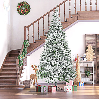 Grand arbre de Noël artificiel enneigé enneigé