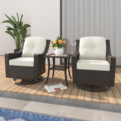 2-Piece Swivel Chair Set with Cushions & Glass Coffee Table – Iron Frame, Weather-Resistant Rattan. by Winston Porter