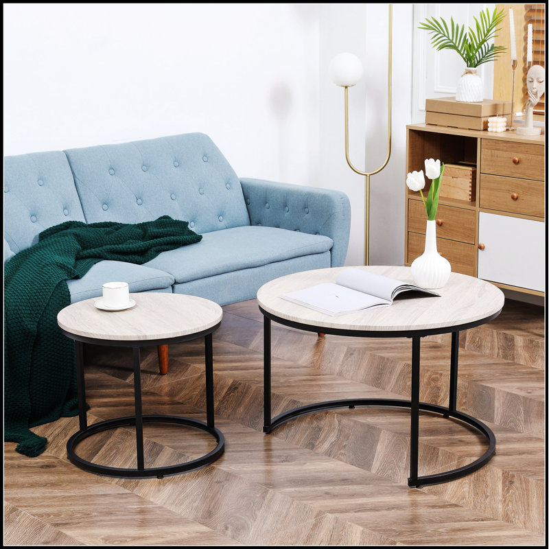 Ensemble de 2 tables gigognes rondes avec structure en métal, peu encombrantes et élégantes pour les salons modernes