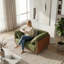Fauteuil moderne à assise profonde avec revêtement vert olive et accoudoirs bouclés orange