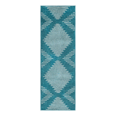 Tapis bleu à motif géométrique