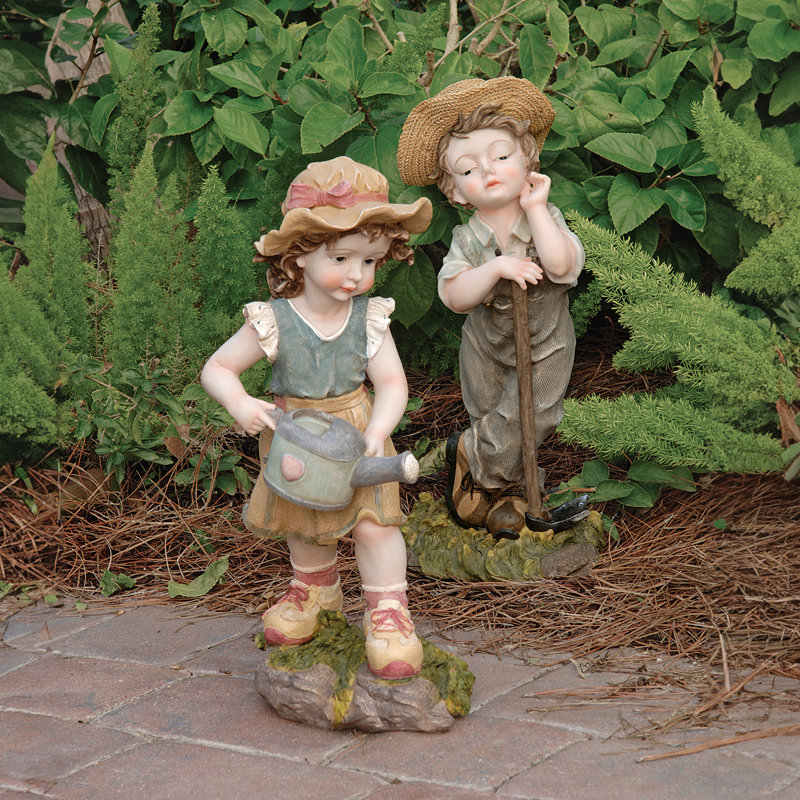2 Piece Fanny and Frank Farmer Statue Set