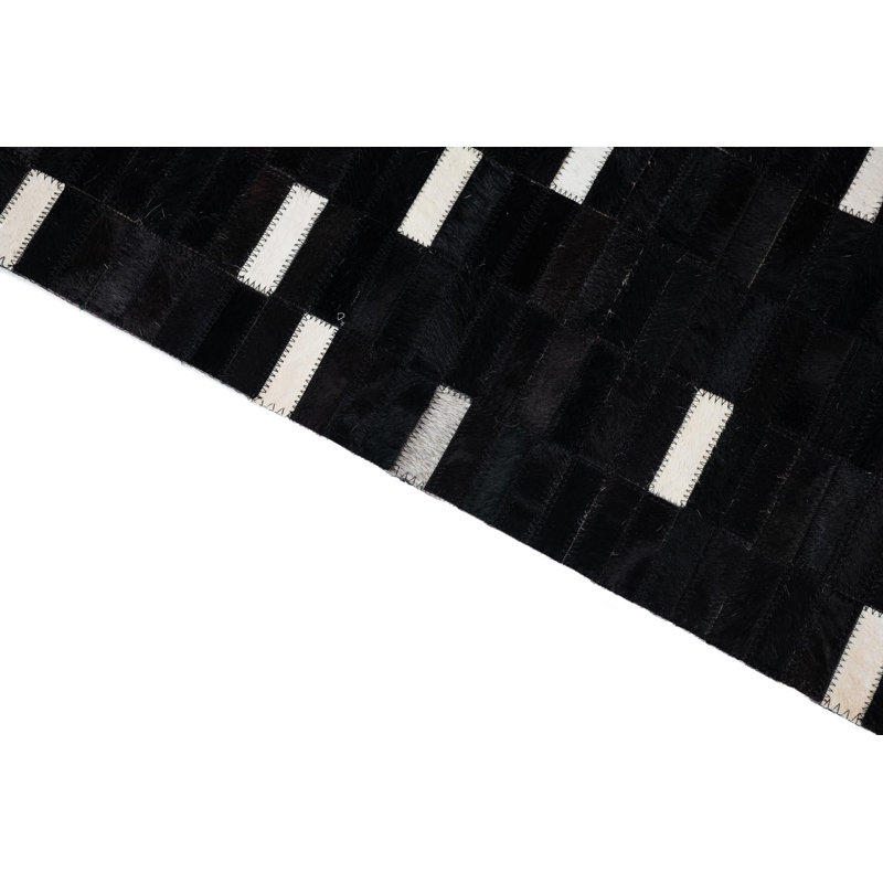 Tapis noir Isidore