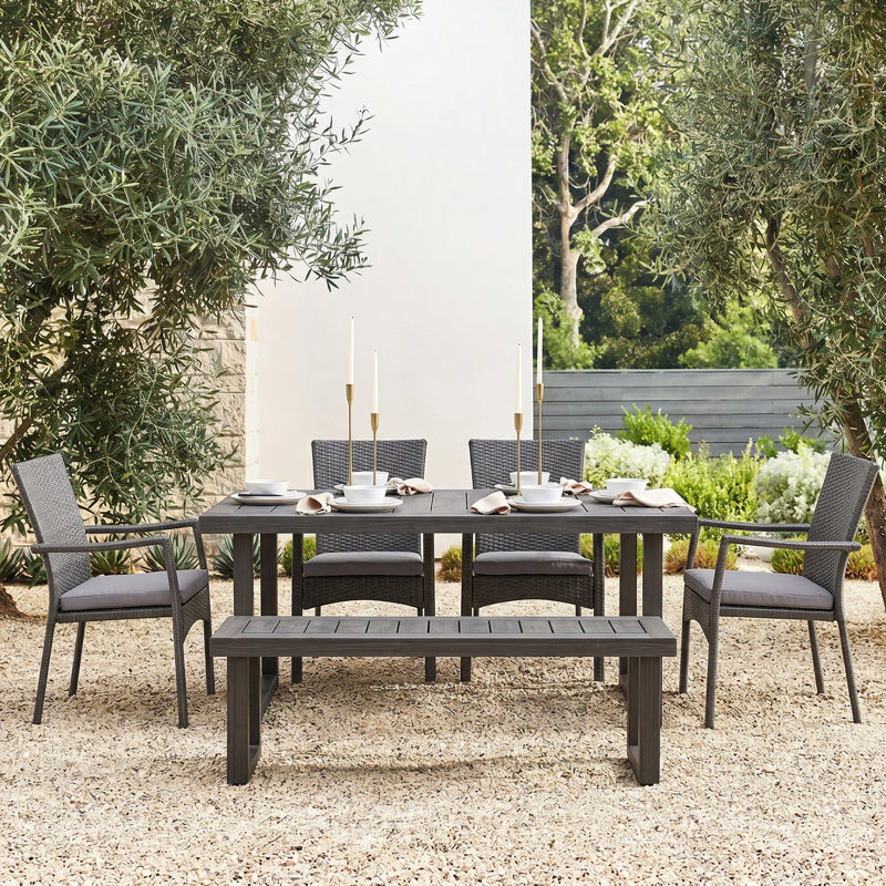 Revilla 6 - Person Acacia Wicker Patio Dining Set with Rectangular Table , Cushions Included