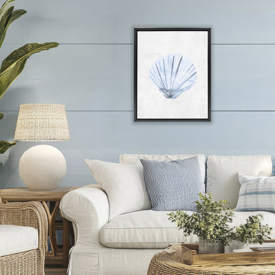 Cadre flottant discret à coquille de palourde, design par Camila Juncos