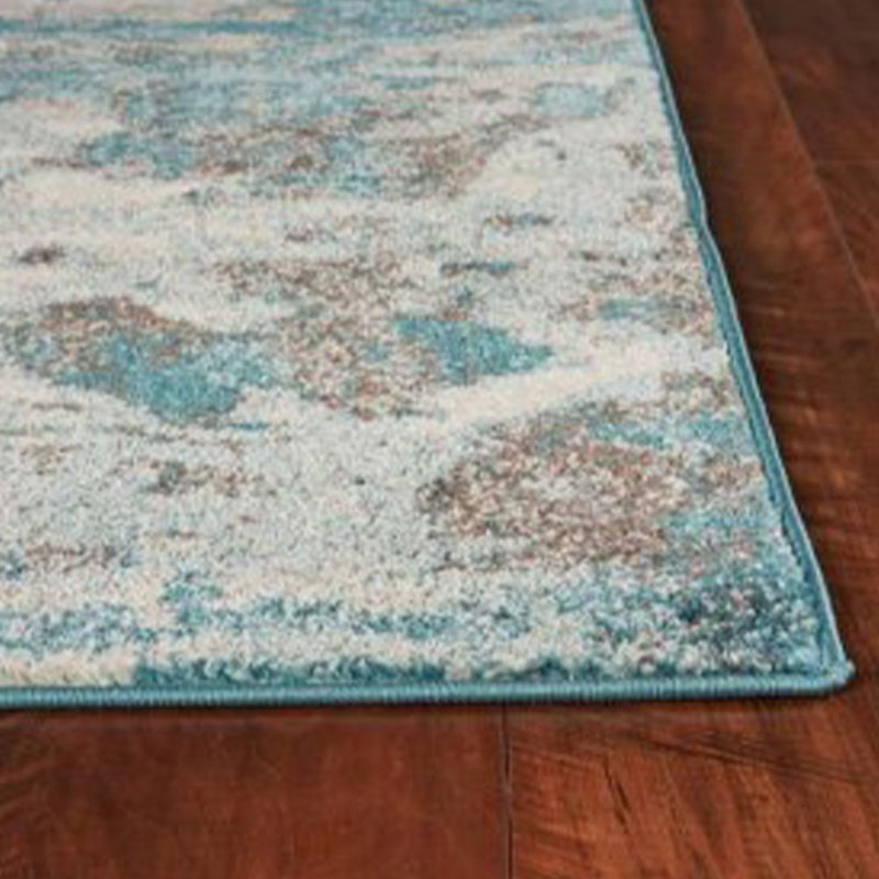 Tapis ivoire / bleu sarcelle abstrait rectangulaire en polypropylène tissé à la machine 8 pi x 10 pi