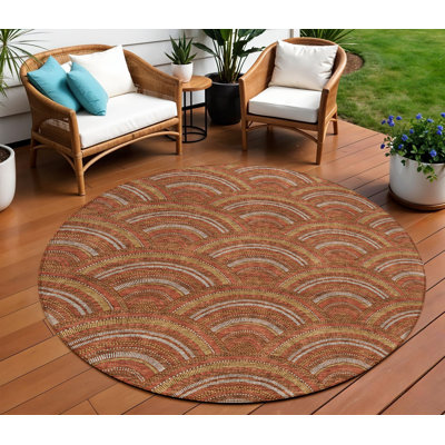 8' Orange Gold And Ivory Round Geometric Washable Indoor Outdoor Area Rug