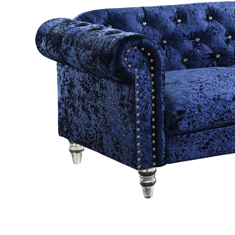 Causeuse en velours bleu