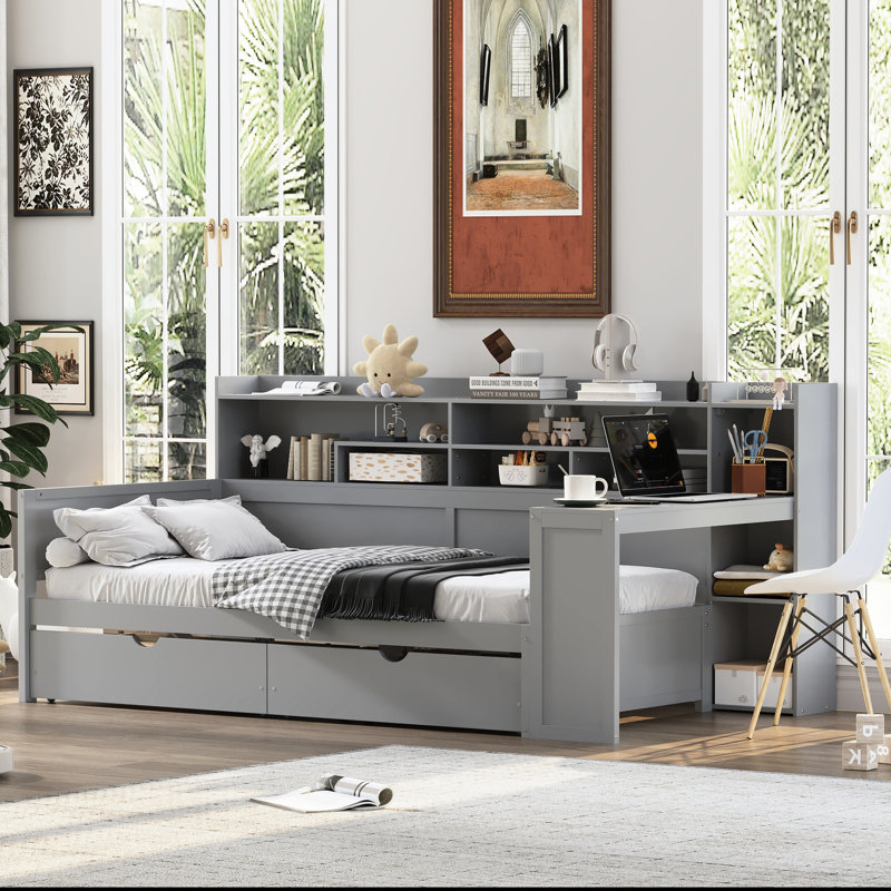 Lit de jour simple gris en bois avec plusieurs rangements, deux tiroirs et un bureau d'étude fonctionnel pour la chambre à coucher