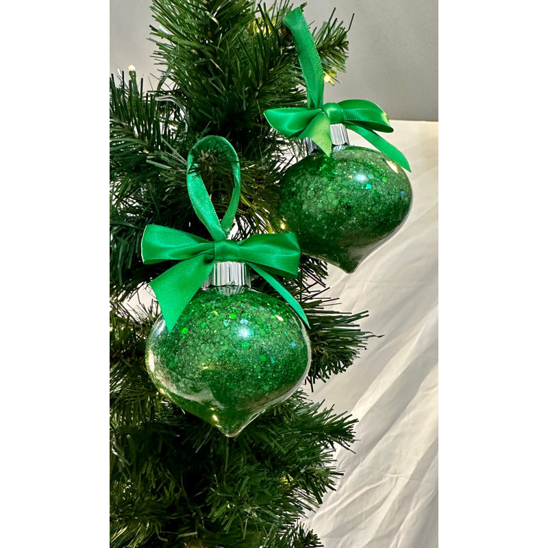 Emerald Green Glam Collection: Beautiful Emerald Green Glittered Ornament with a matching Satin Bow and Ribbon.