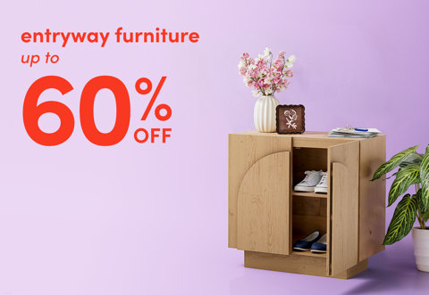 Entryway furniture up to 60 percent off with a light wood shoe cabinet featuring arched door details, a vase of flowers, and a houseplant against a lilac background.