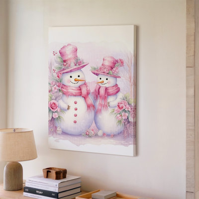 Canvas A Whimsical Winter Scene Featuring Two Cheerful Snowmen One Larger Wall Art And One Smaller Adorned With Pastel Pink Top Hats Canvas Wall Art