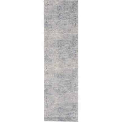 Tapis abstrait gris tissé à la machine