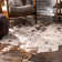 Shaped Cheever Animal Print Area Rug
