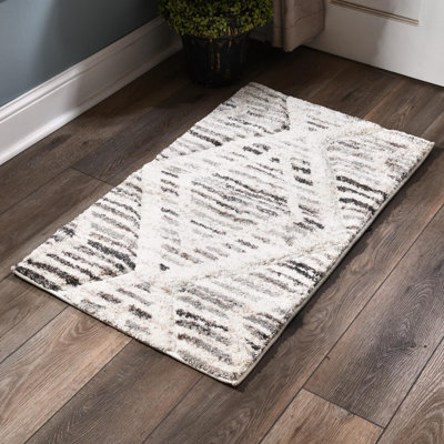 Tapis à motif géométrique abstrait Arbon Collection