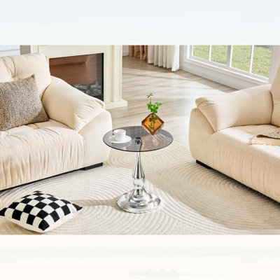 Petite table d'appoint en métal avec plateau rond en verre trempé