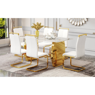 Modern dining set | rock plate table top with gold metal legs | comfortable seating | versatile style for most homes