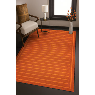 Tapis tissé orange à rayures Mosso