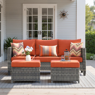 Harbin 76.77" Wide Outdoor Wicker Patio Sofa with Cushions