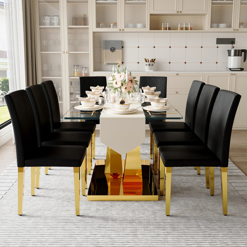 Ensemble de table de salle à manger moderne en verre trempé avec base en forme de V doré et chaises en cuir de polyuréthane, ensemble de table de salle à manger de luxe