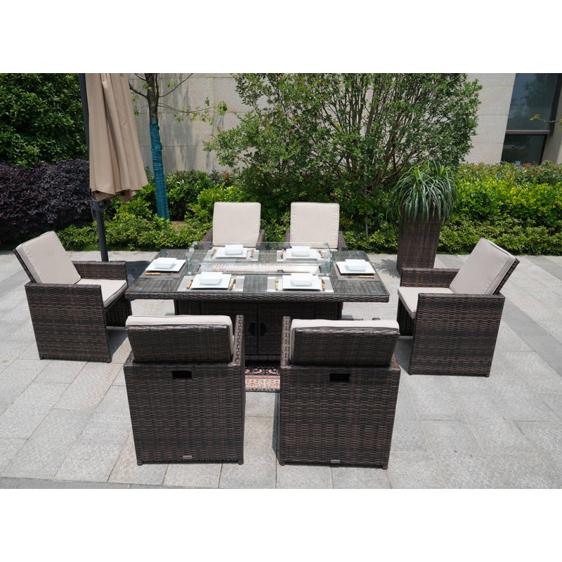 Aerolyn 6 - Person Wicker Patio Dining Set with Rectangular Table , Cushions Included, Cream, Brown