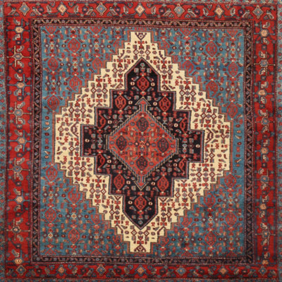 Tapis oriental rouge / bleu / crème