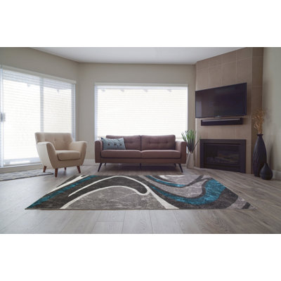 Tapis turquoise / gris foncé Spruill